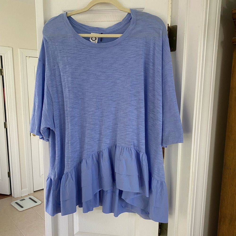 Super cute periwinkle blue top sold by Sundance